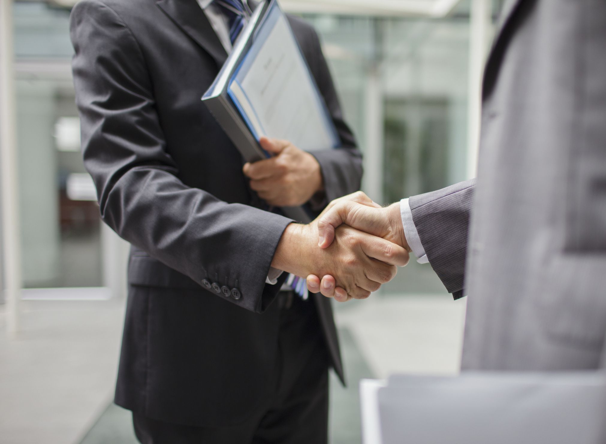 Handshake with portfolio.jpg